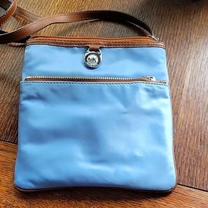 Is michael kors cross body bag.